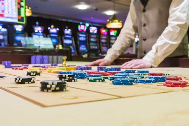 Gambling chips on a game table roulette