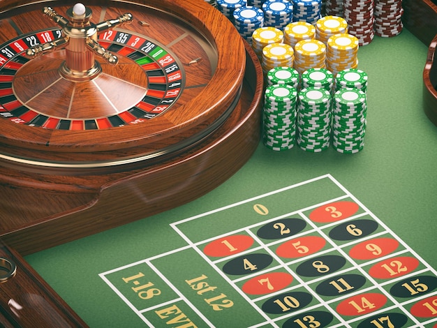 写真 ギャンブルやカジノの背景コンセプト緑のテーブルにカジノ チップを備えたカジノ ルーレット ホイール