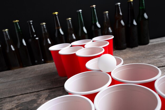 Game Beer Pong on wooden table