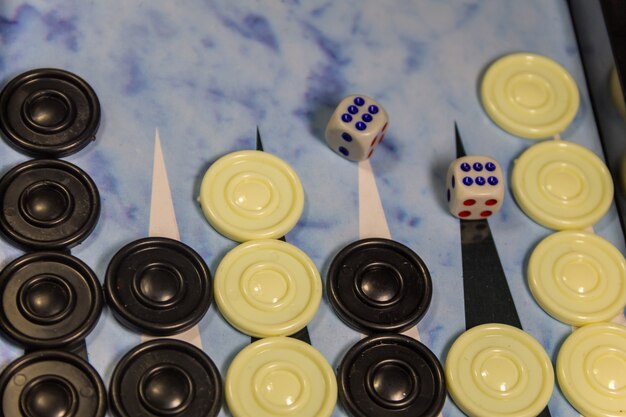 Game field in a backgammon with dice and checkers. Game concept. Board game