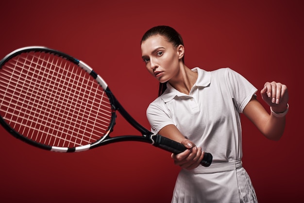 Game set match young tennis player standing isolated  with a racket and