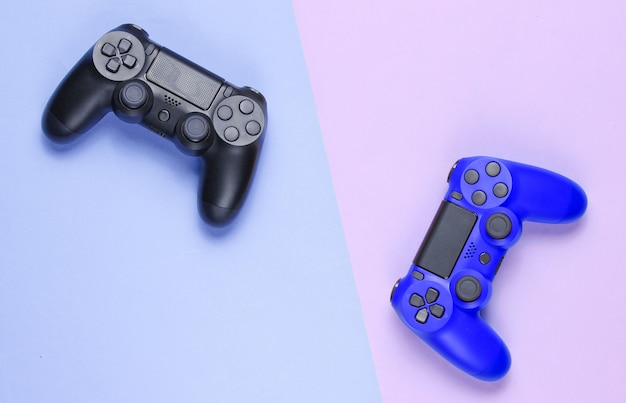 Gamepad on a colored paper background