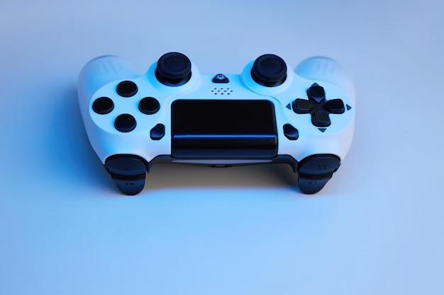 Foto gamepad op abstracte achtergrond met lichteffecten