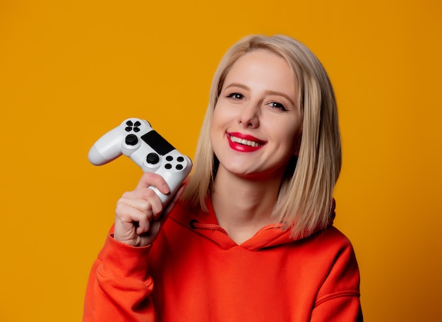 Gamer girl with white gamepad