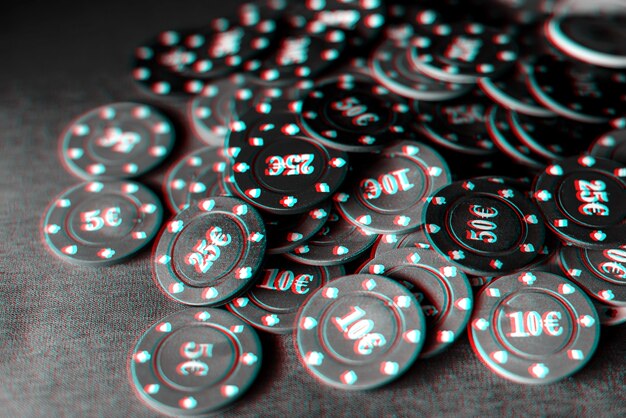 Photo gaming chips for gambling card games and poker on the table close-up. black and white photo with glitch effect