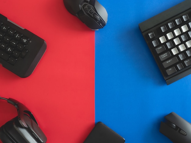 Gaming desk with keyboard, mouse and headphones