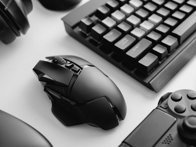 Gaming desk with keyboard, mouse and headphones