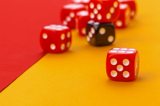 Gaming dice on color background