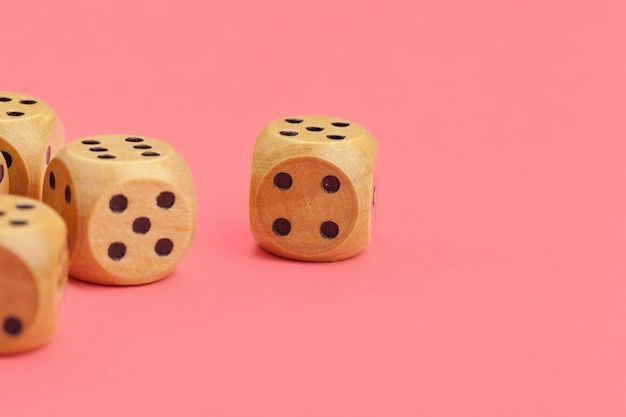 Photo gaming dice on pink