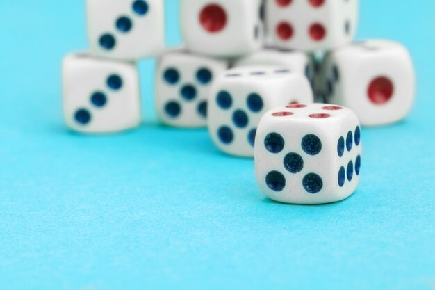 Gaming dices on blue. Game concept.