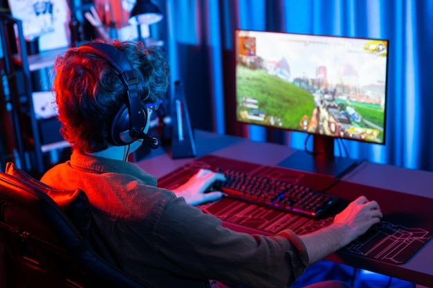 gaming streamer team playing battle game shooting at back side image gusher