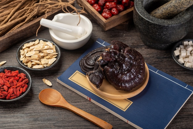 Ganoderma lucidum and traditional Chinese medicine on the table