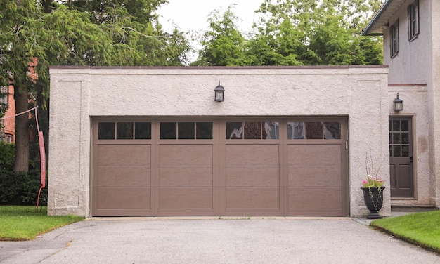 A garage door with a light on the top.