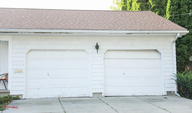 garage embodies individualism mobility and suburban life It symbolizes personal space car cultur