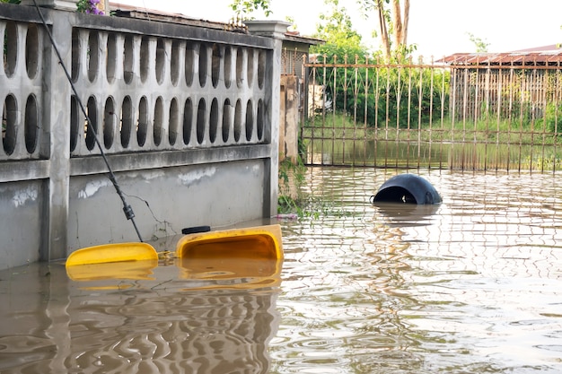 Photo garbage bin float. flooding in town.