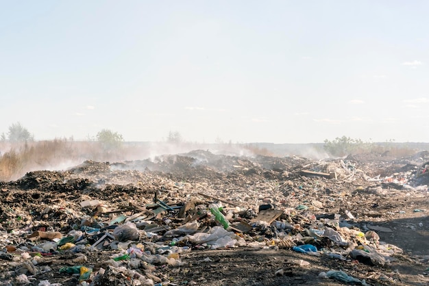 Photo garbage dump with smoke