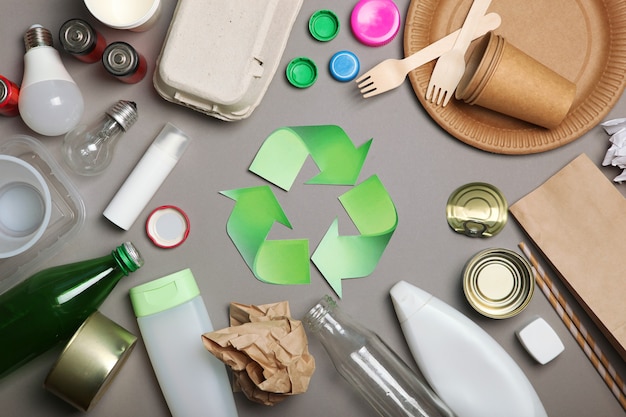 Garbage and recycling sign on a colored background top view