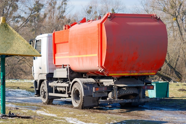 Garbage track on city beach in winter