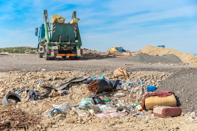 Garbage truck brought the waste to the landfill