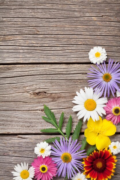 Garden flowers on wood