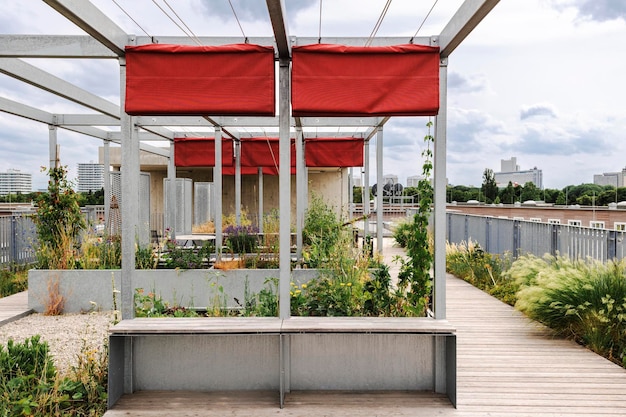 Garden Roof Terrace with Pergola Awning from Fabric on Roof Building Modern Community Patio Garden