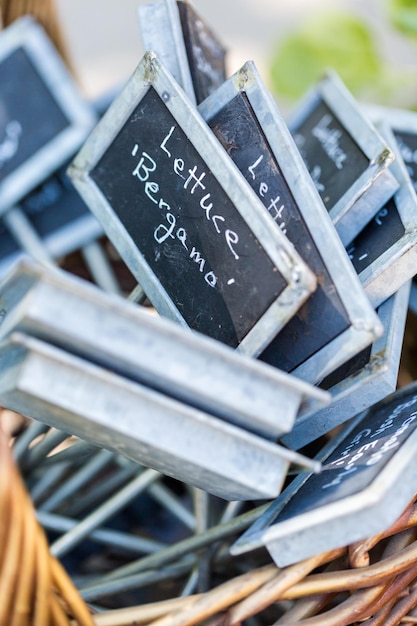 Garden tags in the basket ready to mark plants.