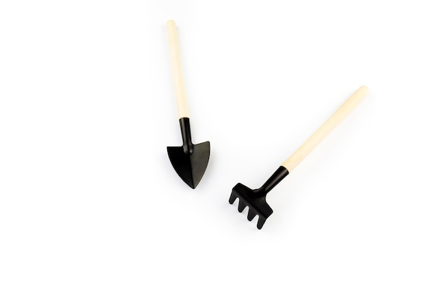 Photo garden tools on a white background. manual tillage.