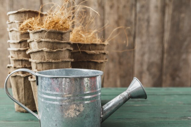 Gardening accessories on a rustic wooden background