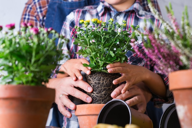 Gardening man, father and a boy, kid during staying at home. 