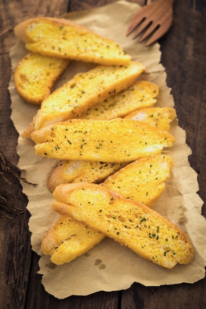 Garlic bread on paper