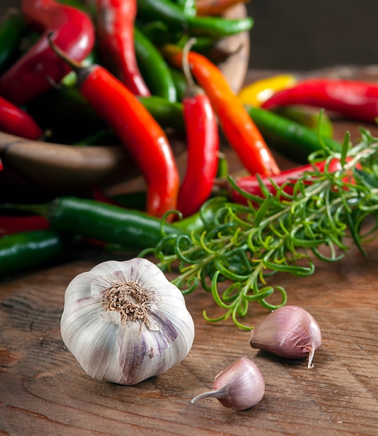 Garlic and chillies on a wooden board