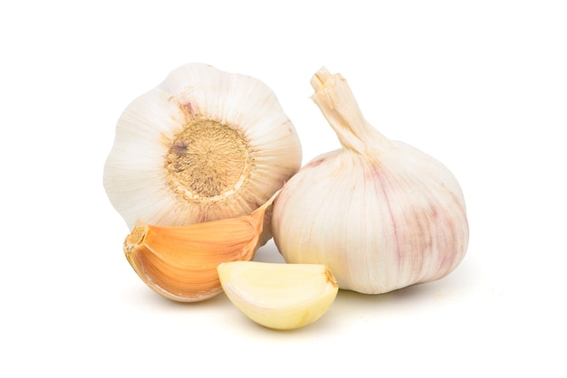 Garlic cloves and bulb isolated on white background