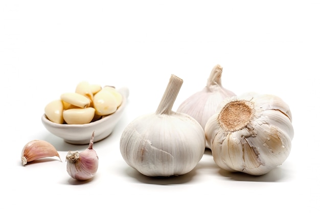 Garlic cloves on white