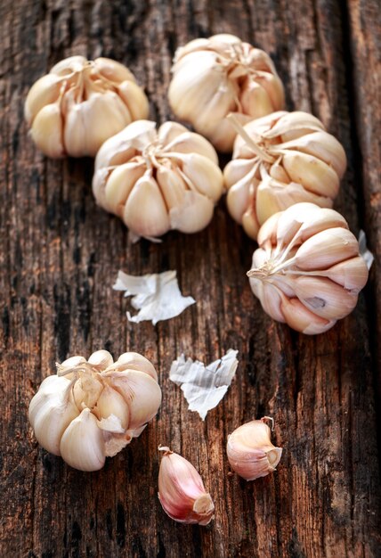 Garlic cloves on the wooden table