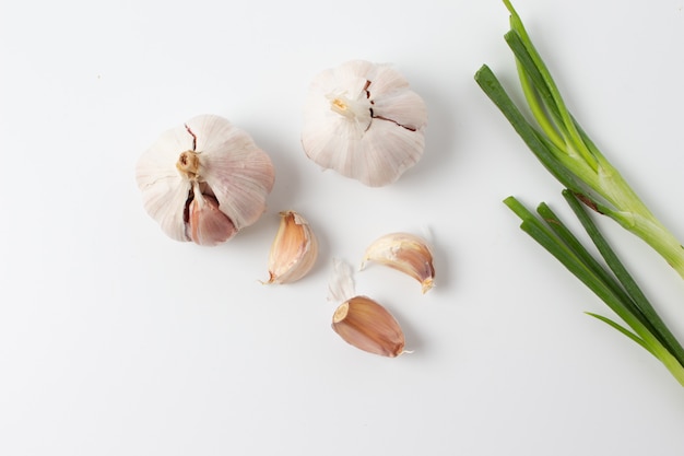 Garlic isolated on white background. Top view