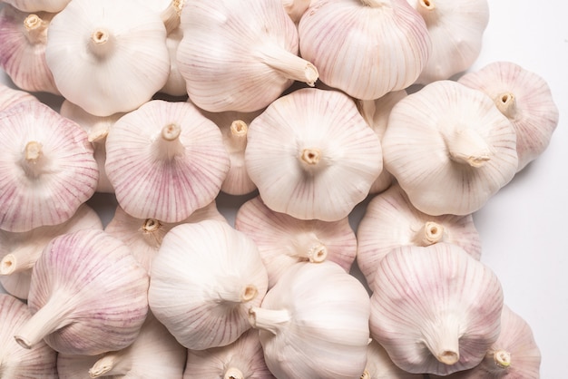 Garlic isolated on a white surface. Top view.