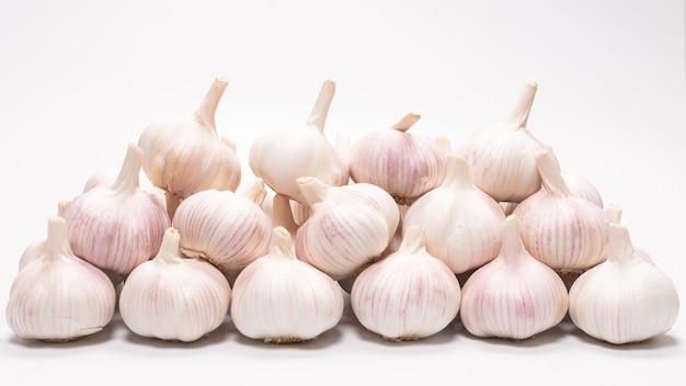 Garlic isolated on a white surface. Top view.