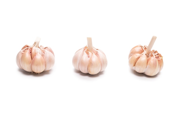 Garlic isolated on a white surface. Top view.