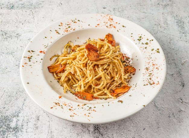 Garlic noodle served in isolated on grey background top view of singaporean food