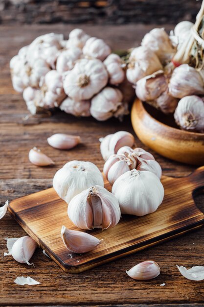 garlic on old wooden table background