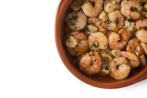 Garlic prawns in crock pot isolated on white