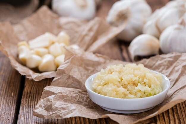 Garlic press with fresh garlic