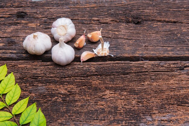 Garlic split petals on an old wooden background