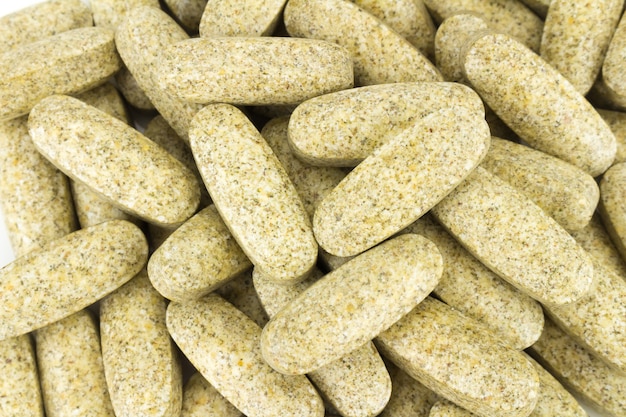 garlic supplements food background. texture 