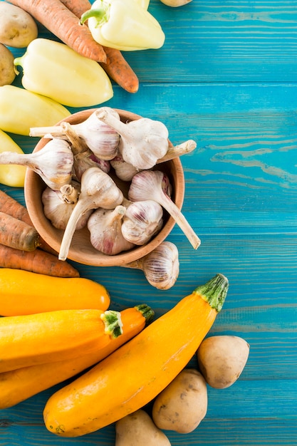 Garlic and vegetables on the table