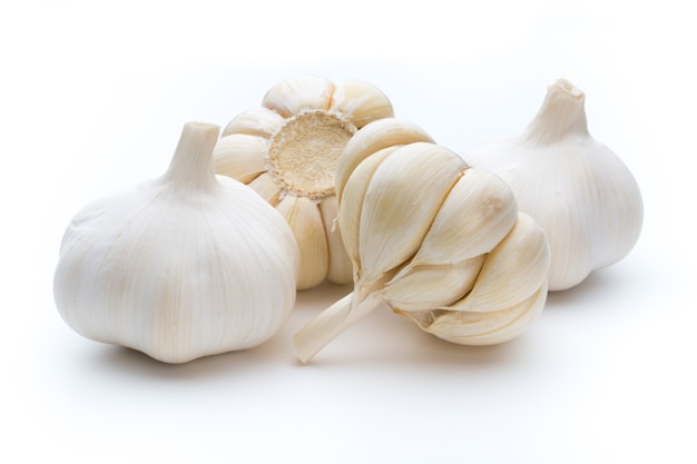 Garlic on white surface