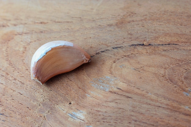 Garlic on wood background