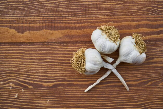 Garlic on Wooden Background