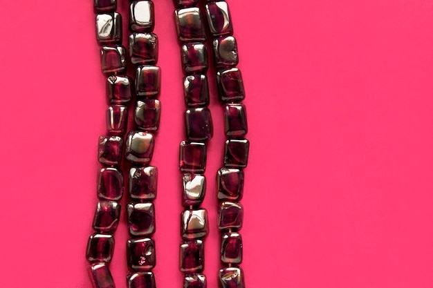 Garnet beads on pink