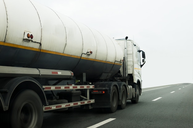 Gas or oil truck on road transport, transportation concept.